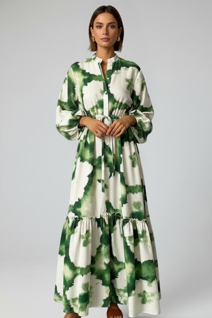 Boho-chic long sleeve V-neck maxi dress with vibrant print, perfect for spring