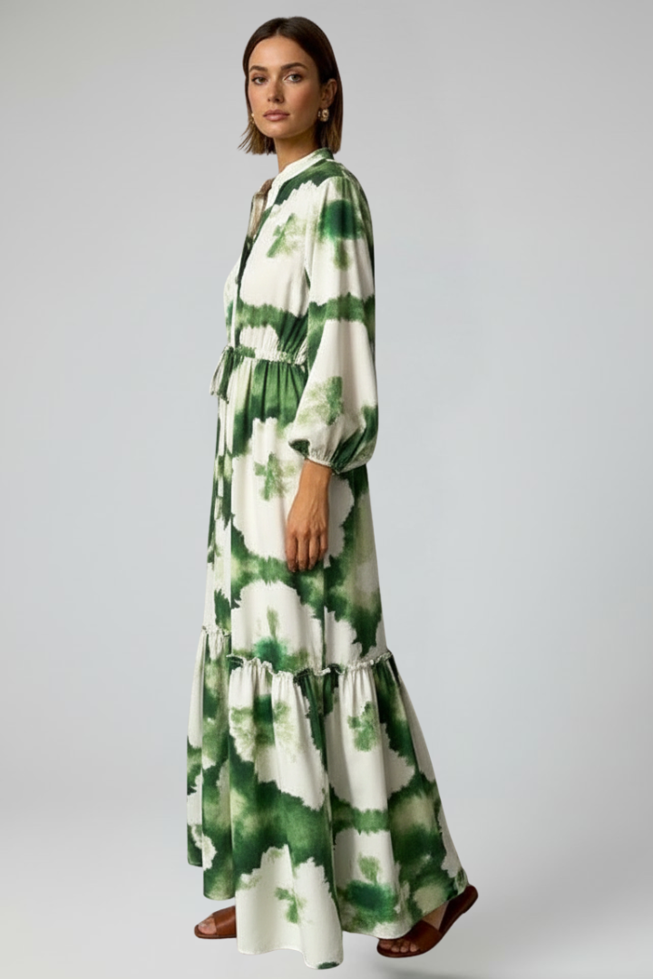 Casual women's maxi dress featuring a V-neck, long sleeves, and an eye-catching print