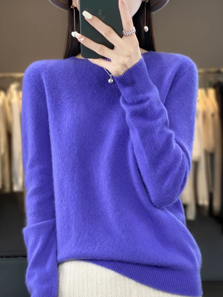 Long sleeve elegant women's sweater, soft round neck pullover for chic versatile style.