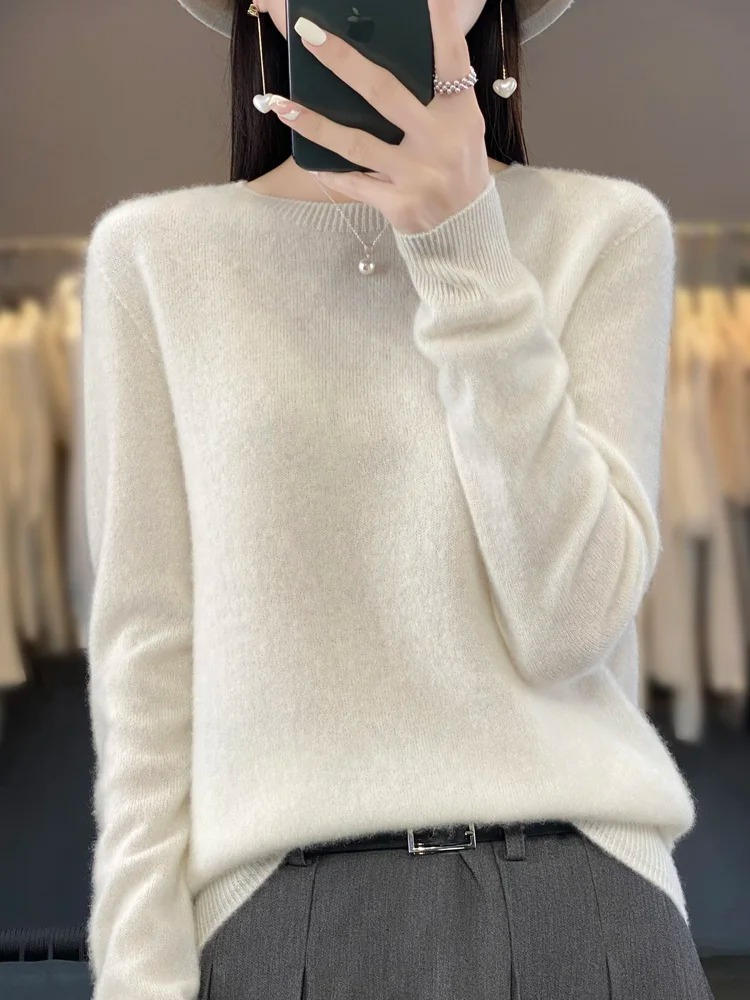 Women's versatile elegant top, soft knit round neck pullover sweater for all seasons.