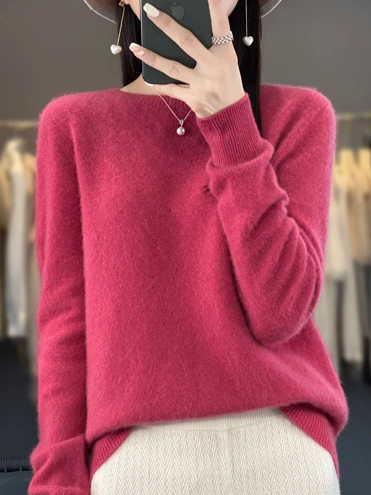 Elegant women's round neck sweater, soft long-sleeve pullover for comfortable chic style.
