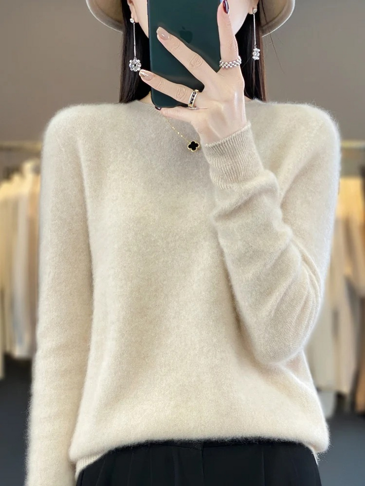 Chic women's elegant pullover sweater with a classic round neck, comfortable soft knit.