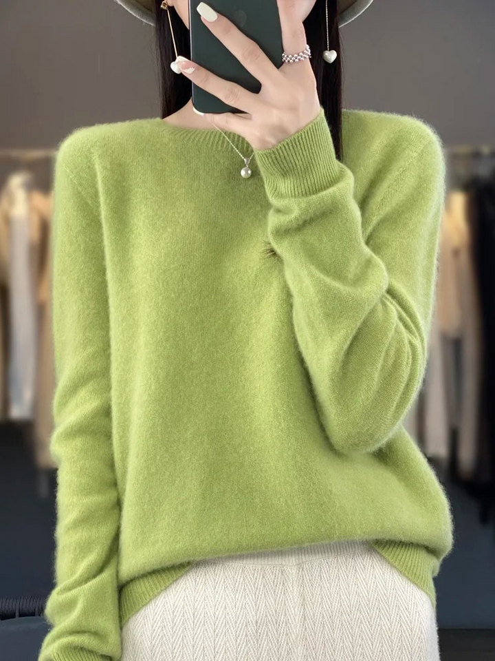 Versatile women's round neck sweater, soft and elegant for daily wear or layering.