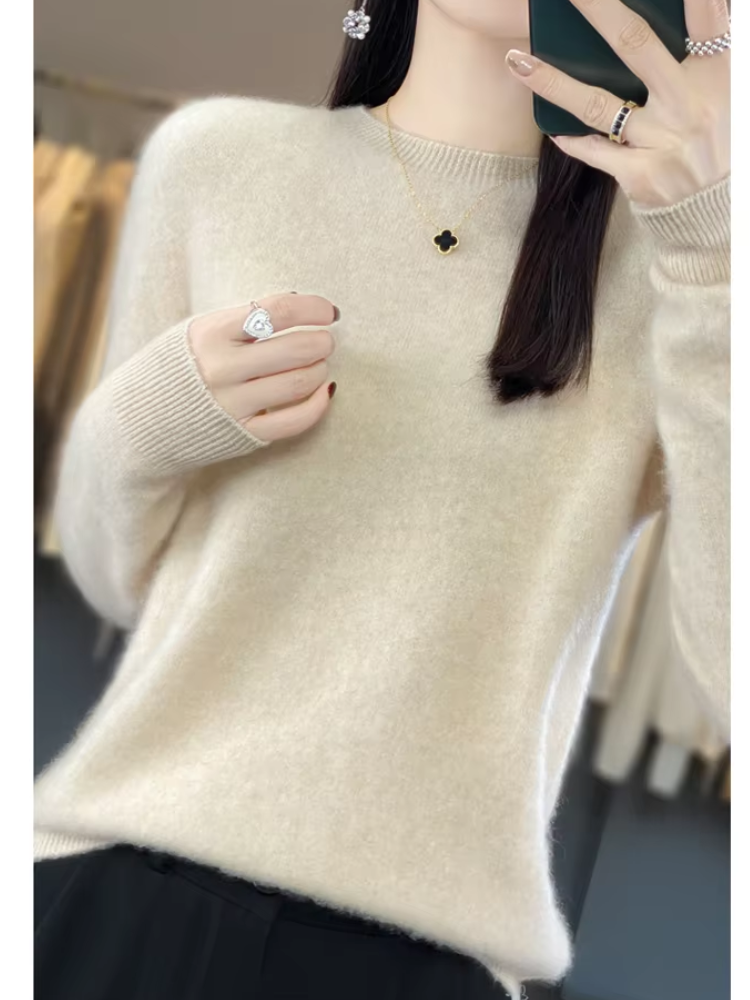 Classic round neck women's sweater, soft pullover ideal for versatile elegant styling.
