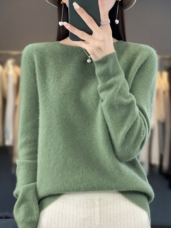 Stylish women's round neck pullover, soft knit for an elegant, versatile apparel choice.