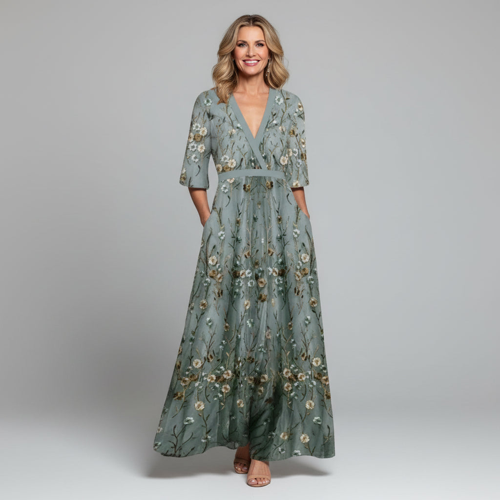Sage green floral embroidered maxi dress for women, an elegant bohemian summer holiday or wedding guest gown.