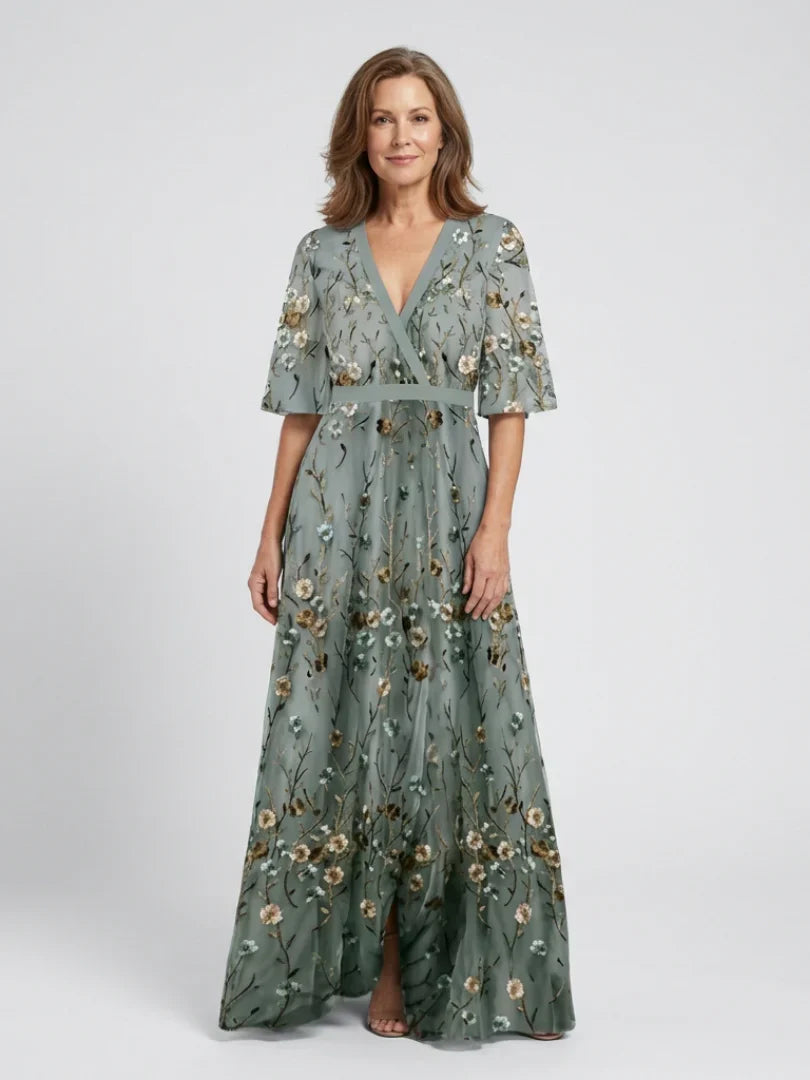 Bohemian style floral embroidered maxi dress in sage green, an elegant summer holiday & wedding guest gown.