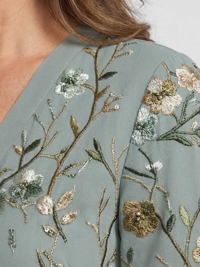 Stylish women's summer floral embroidered maxi dress in sage green, an elegant choice for holidays.