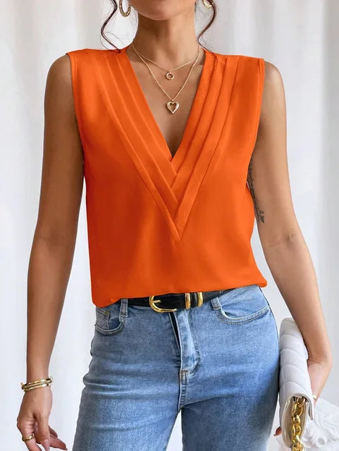 Parisian chic sleeveless women's blouse, elegant and versatile for summer style & workwear.
