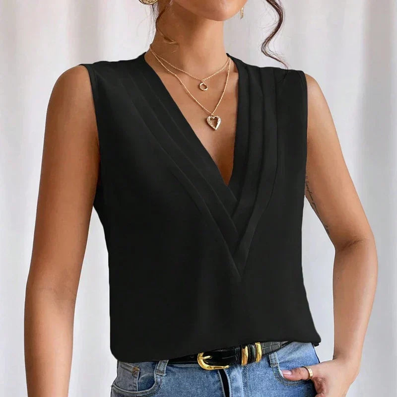 Versatile women's sleeveless top, great for elegant summer outfits & professional workwear.
