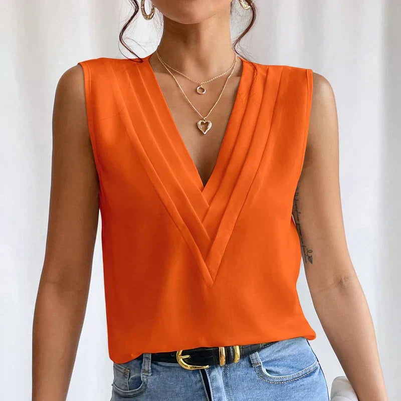 Chic sleeveless blouse for women, offering elegant style for summer fashion & versatile wear.