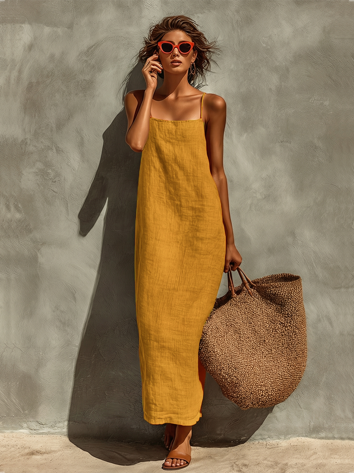 Women's spaghetti strap maxi dress with a sophisticated square neck, sleeveless and flowy for summer elegance.