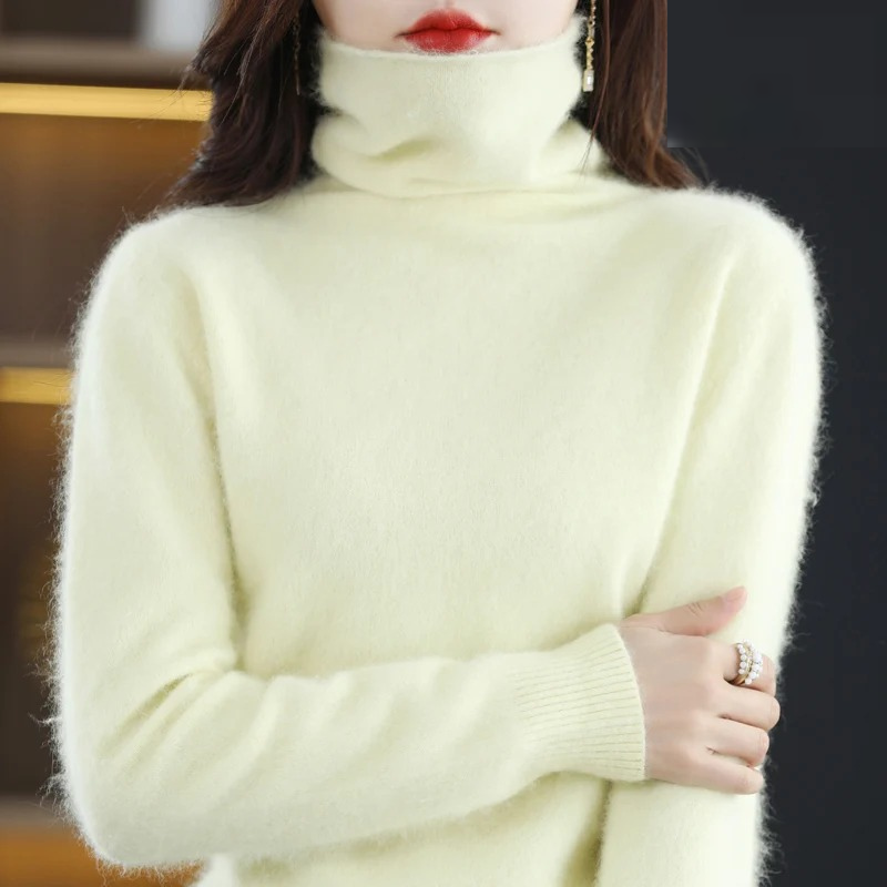 Women's elegant soft turtleneck sweater, perfect for fall and winter layering.