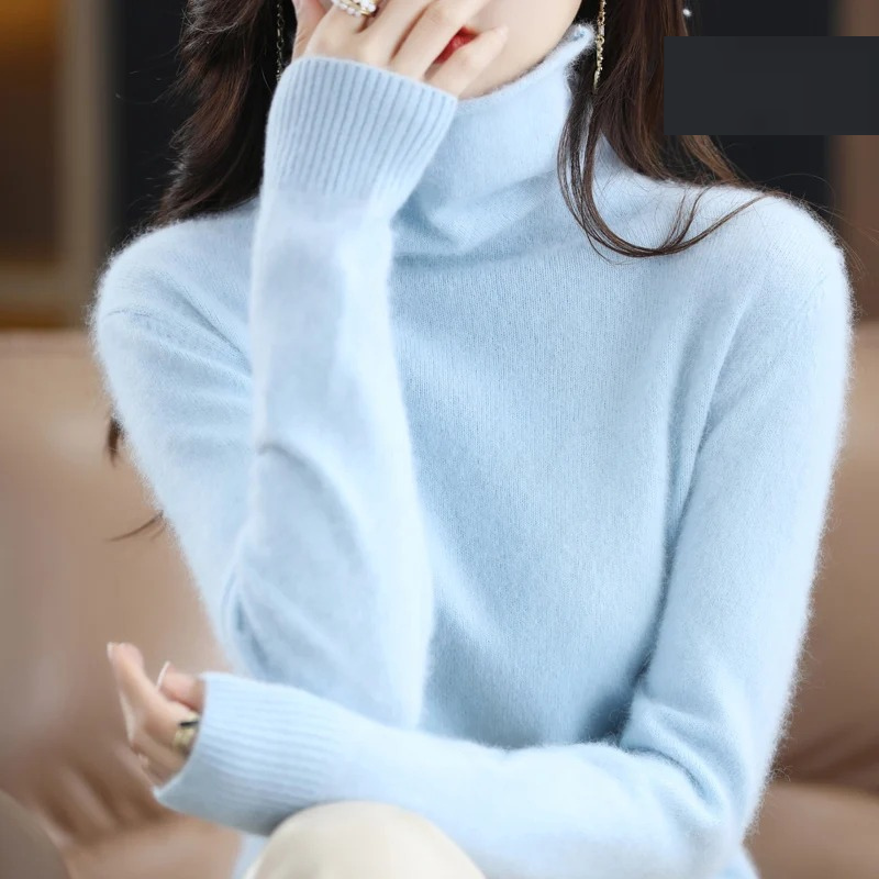 Cozy warm women's turtleneck sweater, a soft pullover for stylish winter layering.