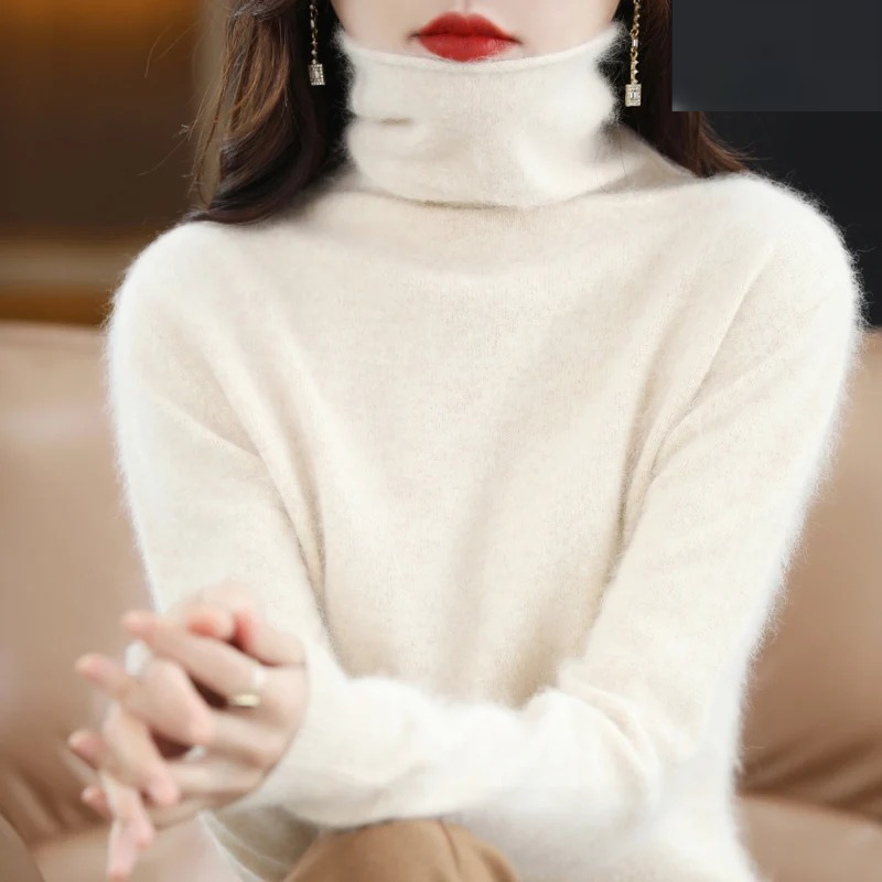 Warm and cozy women's turtleneck sweater, a soft elegant pullover for winter fashion.