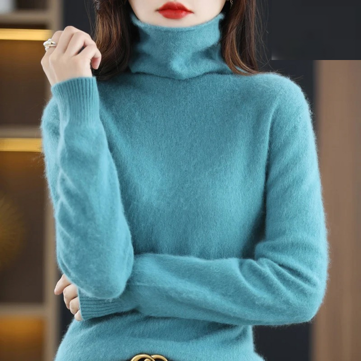 Women's elegant soft turtleneck pullover, a warm and stylish option for fall & winter.