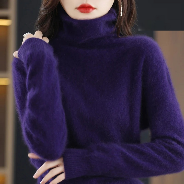 Soft knit women's warm turtleneck, an elegant pullover sweater for stylish fall outfits.