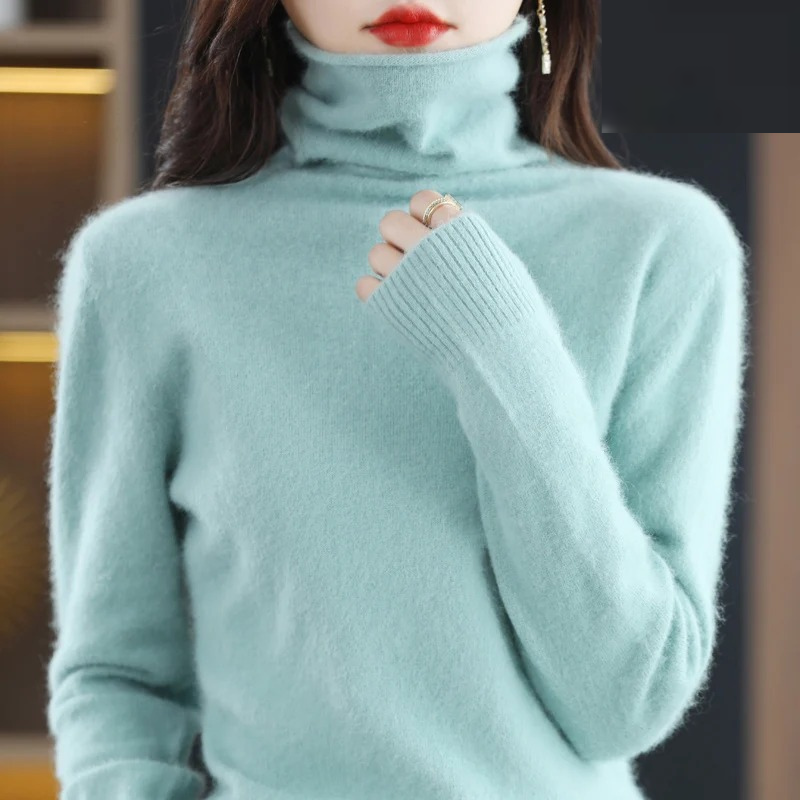 Cozy women's pullover turtleneck sweater, warm and stylish for cold weather.
