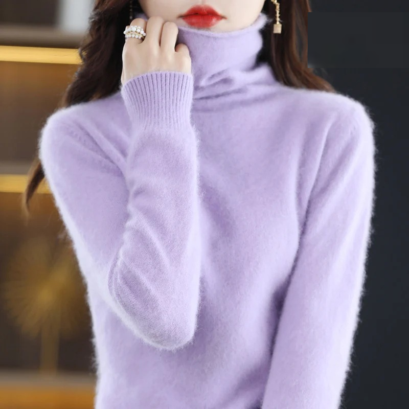 Elegant women's soft turtleneck pullover, ideal for warm, cozy winter layering.