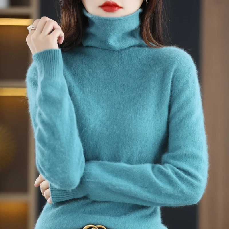 Women's soft knit turtleneck sweater, a warm and stylish pullover for cold seasons.