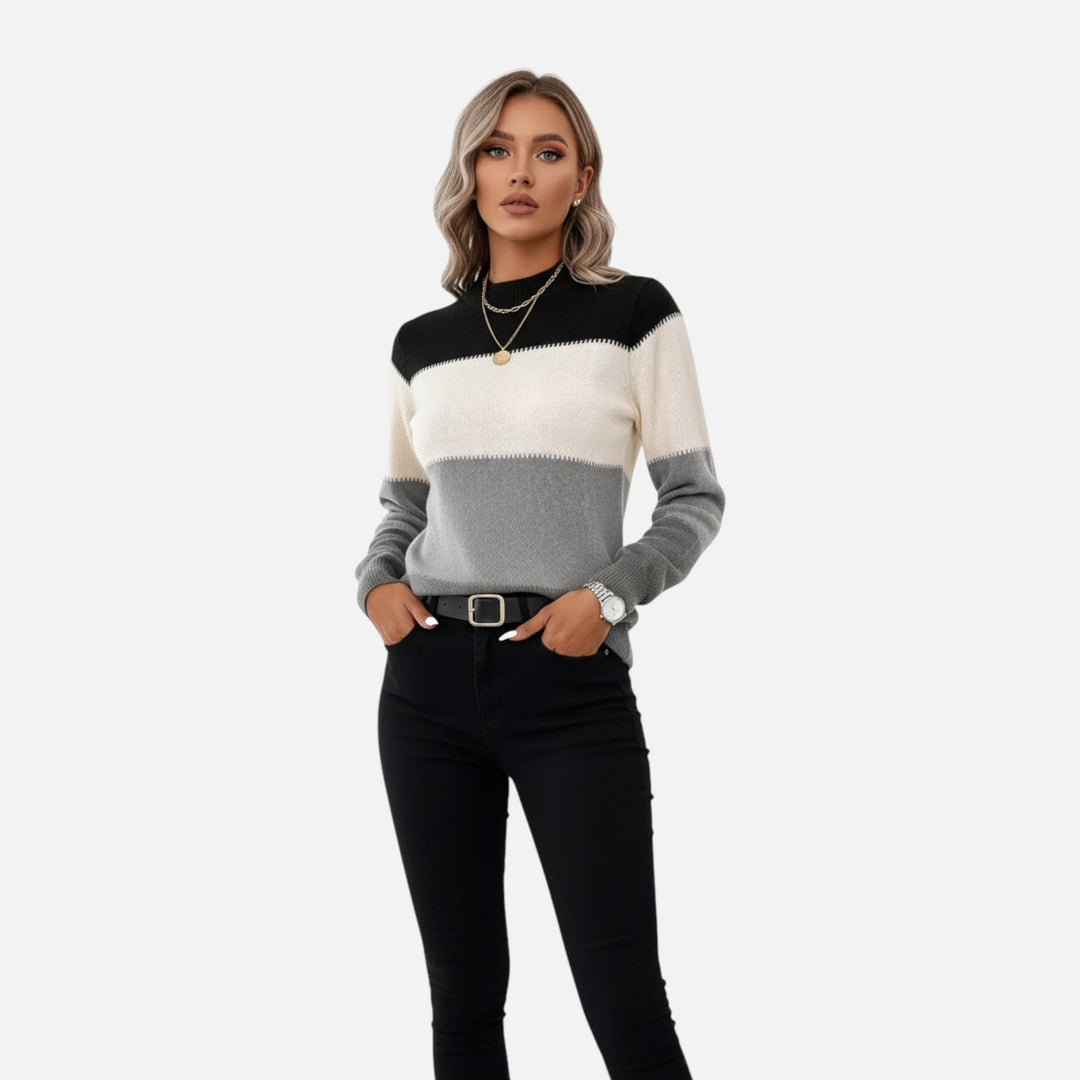 Soft women's striped crew neck pullover, perfect for comfortable all-season layering.