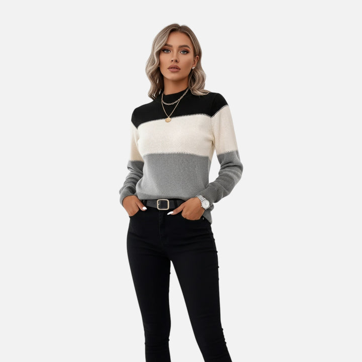 Soft women's striped crew neck pullover, perfect for comfortable all-season layering.