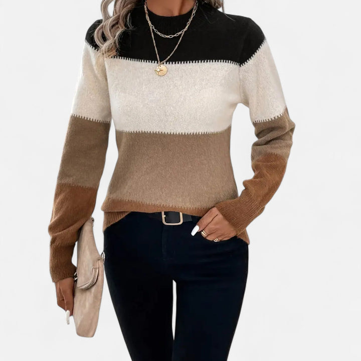 Classic striped women's crew neck pullover, offering refined style and comfort.