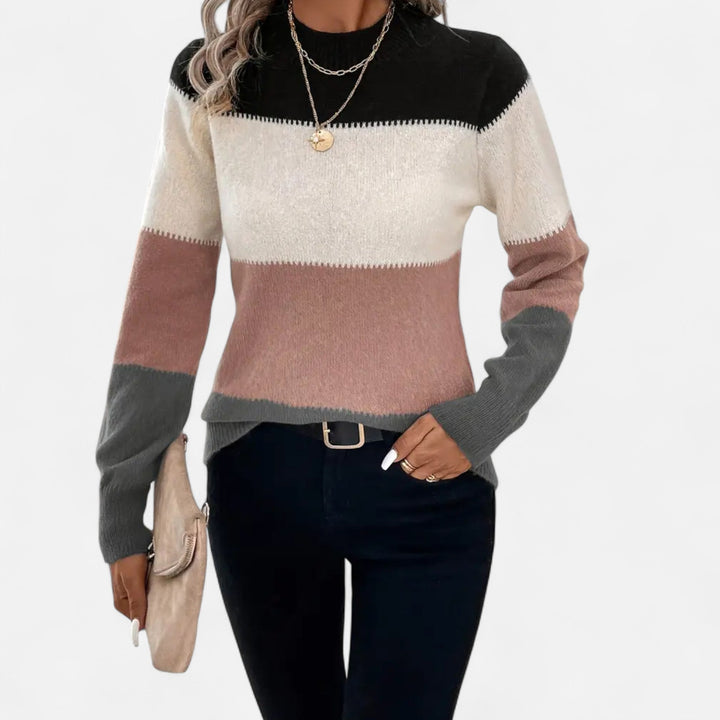 All-season women's striped crew neck pullover, a versatile and elegant wardrobe essential.