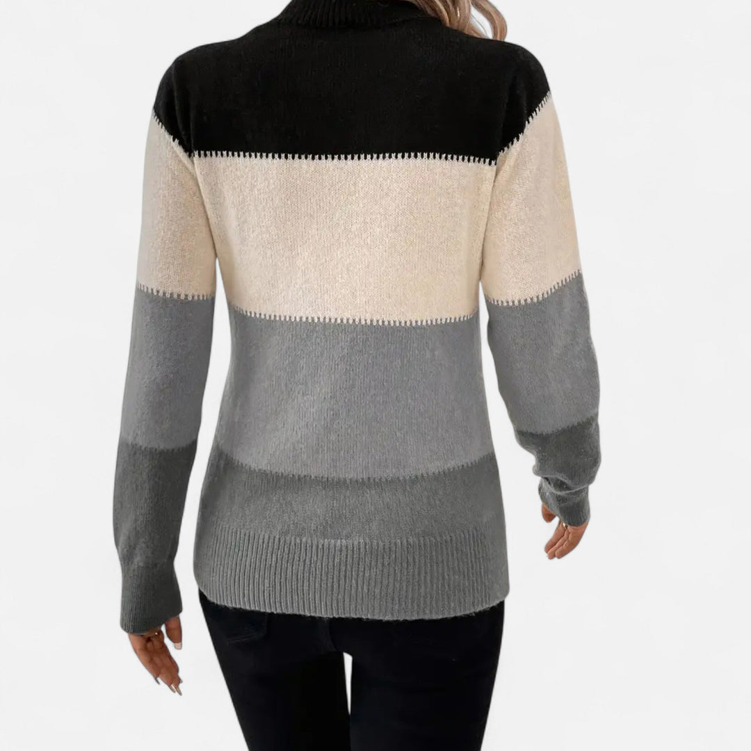 Soft, comfortable women's striped crew neck pullover sweater, designed for chic everyday wear.