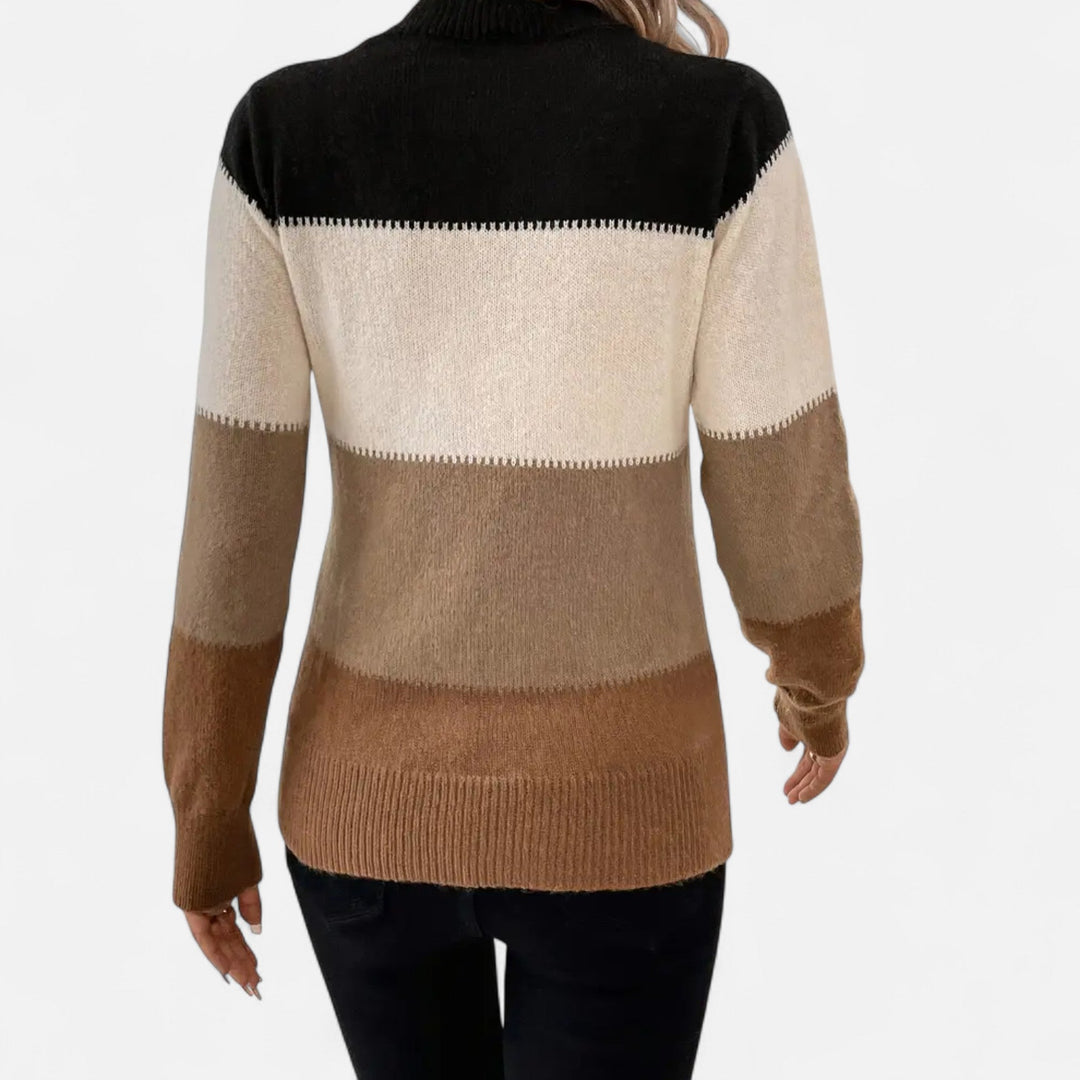 Elegant women's striped crew neck pullover, versatile and soft for chic layering.