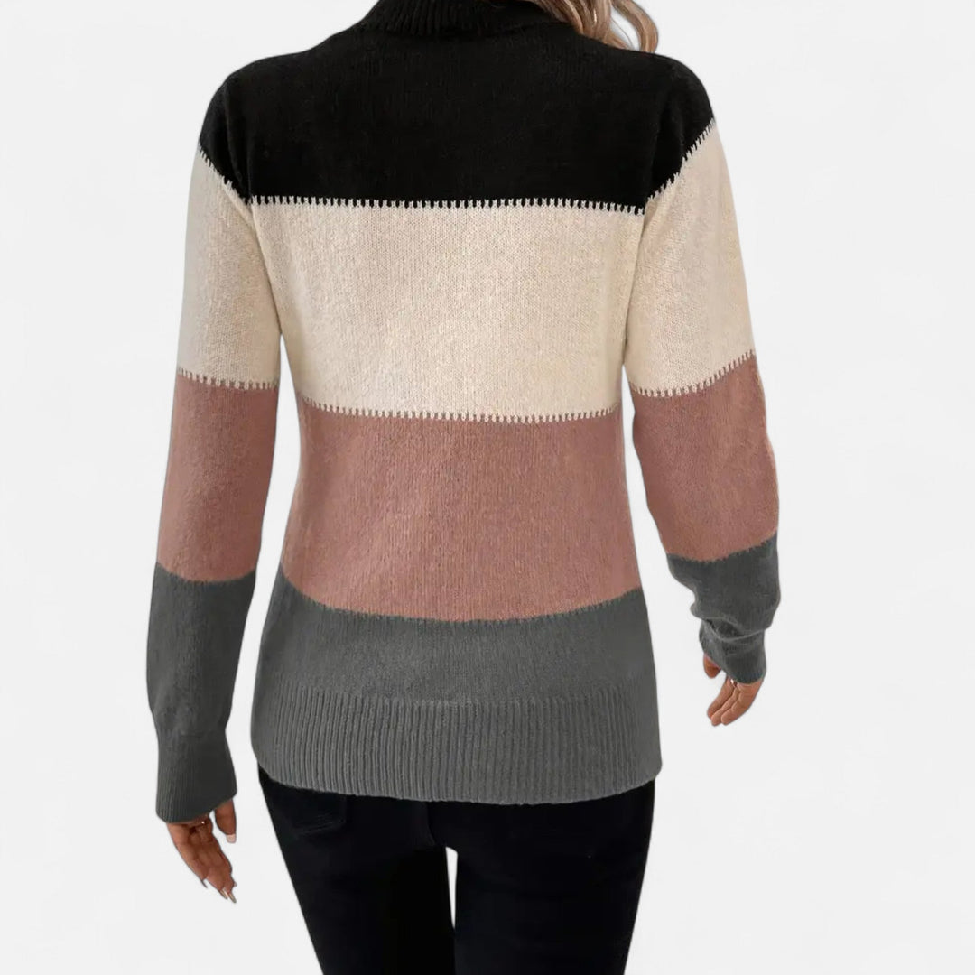 Stylish women's crew neck pullover with horizontal stripes, soft and perfect for everyday elegance.