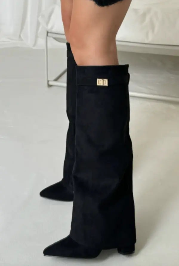 Black elegant tall boots for women, offering refined style and superior comfort for dress wear.