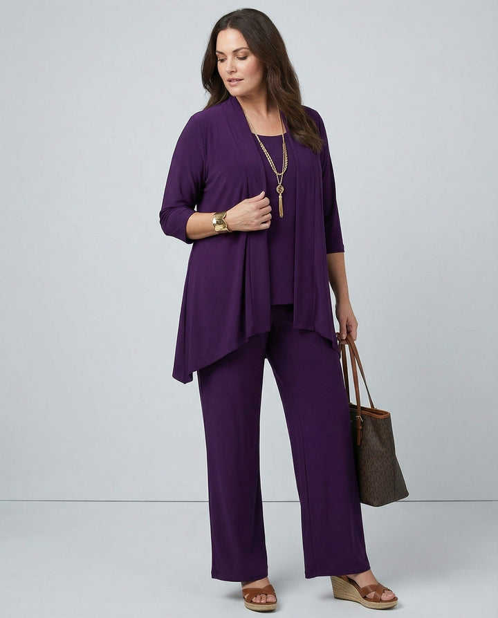 Women's elegant three-piece pantsuit, tailored blazer, vest & trousers for a sharp professional business look.