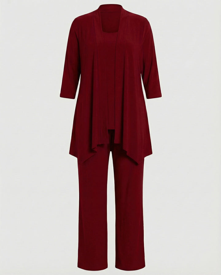 Sophisticated women's three-piece ensemble: a sleek vest, professional blazer, and comfortable tailored pants.