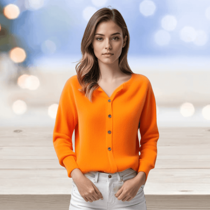 Stylish women's V-neck cardigan sweater. Elegant knitwear, perfect for versatile layering.