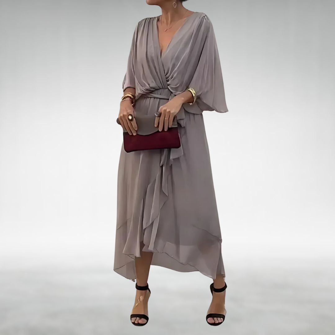 Elegant V-neck women's maxi dress made of light chiffon, suitable for summer fashion and party events.