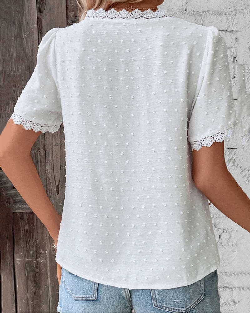 Relaxed fit women's V-neck summer blouse, lightweight textured fabric, short sleeve. Elegant & comfortable.