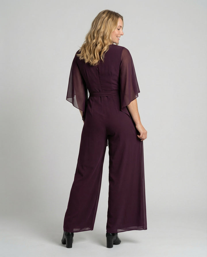 Chic women's wide-leg jumpsuit, perfect for evening parties & special occasions. Features lace-up waist.