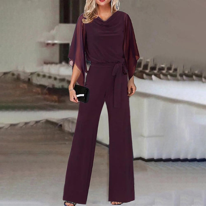 Formal wide-leg jumpsuit for women with a flattering lace-up waist & chic cascading neckline. Evening wear.