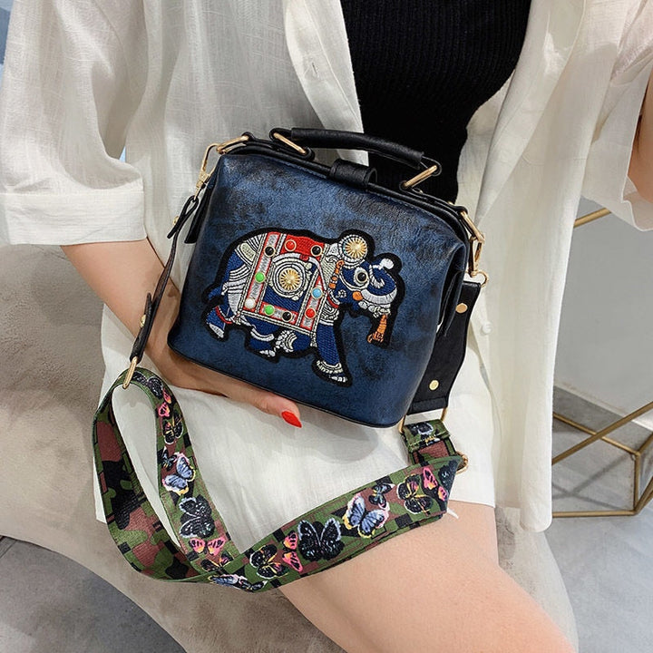 Front view of an embroidered mandala bohemian shoulder bag, lightweight & stylish for women.