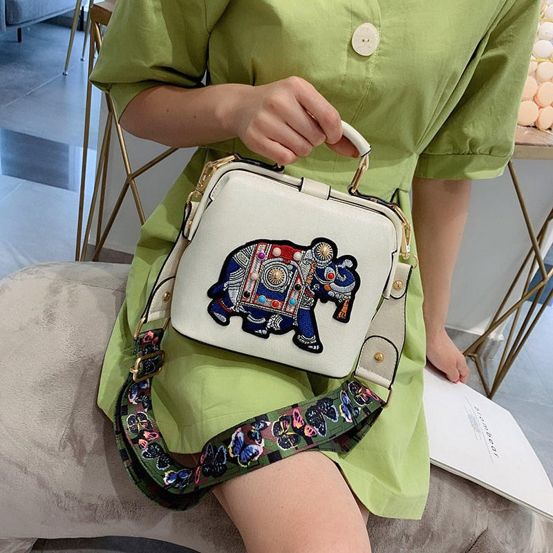 Make a statement with this bohemian embroidered mandala shoulder bag, fashionable women's accessory.