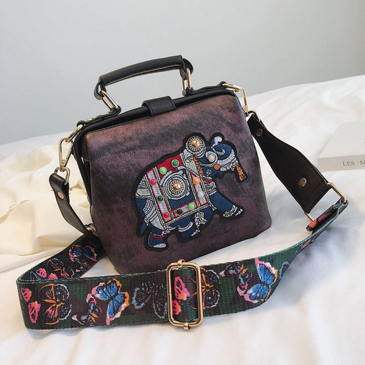 Artistic embroidered mandala shoulder bag, a lightweight bohemian crossbody for women.