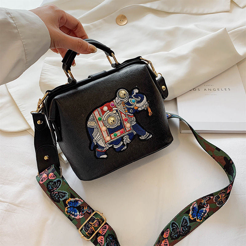 Vibrant embroidered mandala shoulder bag, lightweight bohemian women's fashion purse, unique style.