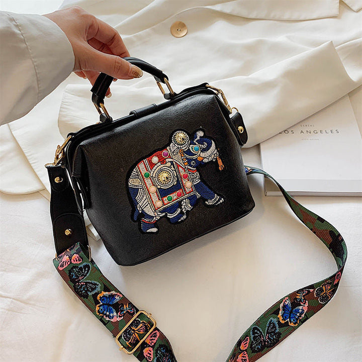 Vibrant embroidered mandala shoulder bag, lightweight bohemian women's fashion purse, unique style.