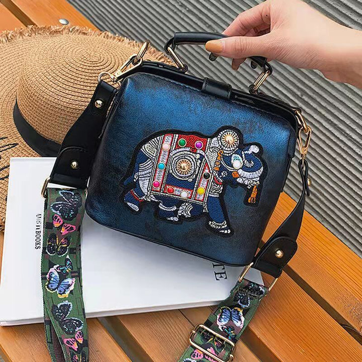 Detailed stitching on this embroidered mandala shoulder bag, lightweight bohemian women's handbag.