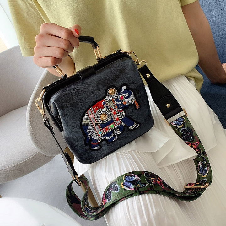 Lightweight embroidered mandala shoulder bag for women, chic bohemian fashion accessory & purse.