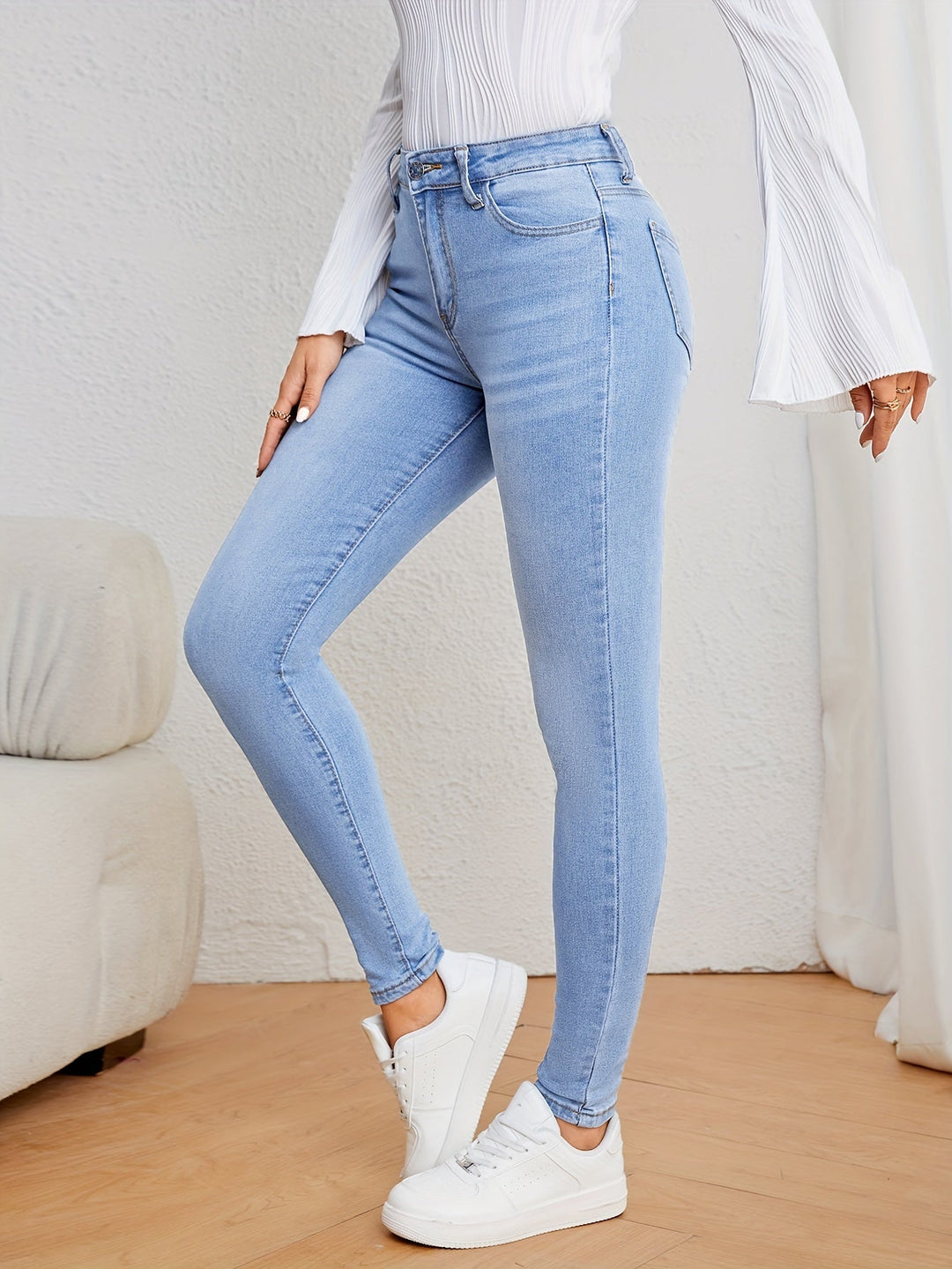 Stylish blue Emma casual skinny jeans for women, perfect for autumn & winter fashion, offering a versatile & sleek look.