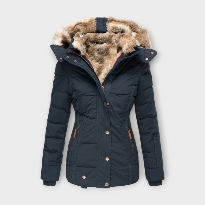 Close-up of faux fur lining on hood of women's winter parka jacket, soft and warm outerwear