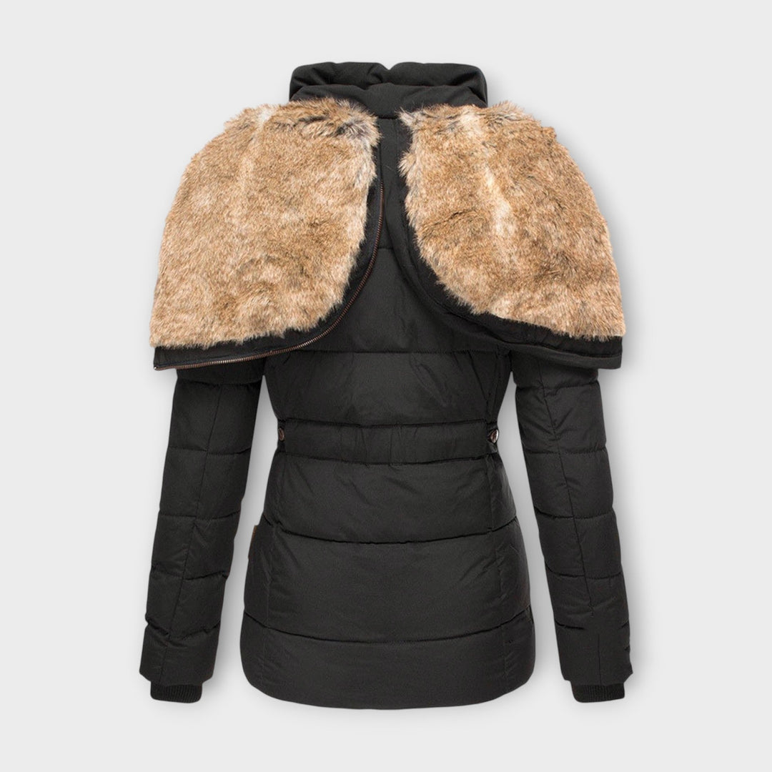 Lifestyle shot: women's winter parka jacket in a snowy environment, warm and protective