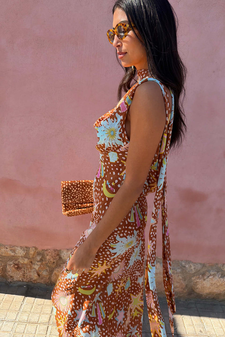 Summer-ready fawn print cowl neck halter dress. Women's flowy maxi house dress with an elegant low back.